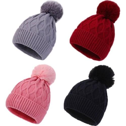 Discount cross-border knitted hats, fashion winter hats, ladies outdoor ski hats, fur balls, elastic and versatile acrylic wool