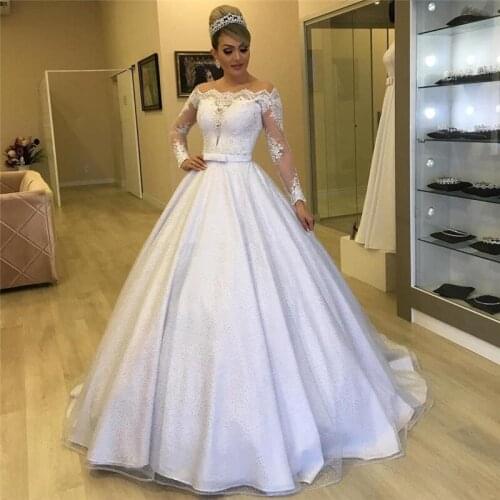 Ball Gown Long Sleeves Lace Appliques Top Wedding Dresses Princess Batuea Neck Bridal Gowns With Buttons Back Princess Garden