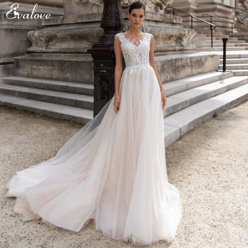 EVALOVE Elegant Scoop Neck Cap Sleeve Bride A-Line Wedding Dresses Graceful Pleated Appliques Sparkly Tulle Vintage Bridal Gown