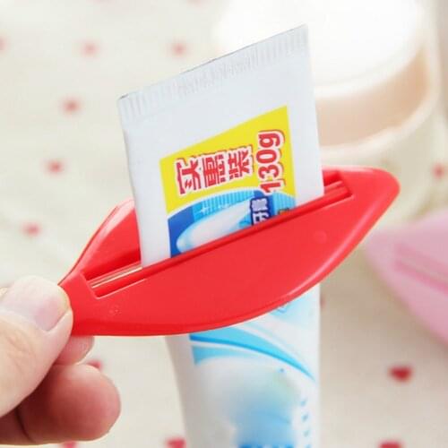 SUEF Novel cute Lip Shape Toothpaste Tube Face Wash Cleaning Foam Cream Roller Squeezer Dispenser ABS Clip bathroom supplies@1