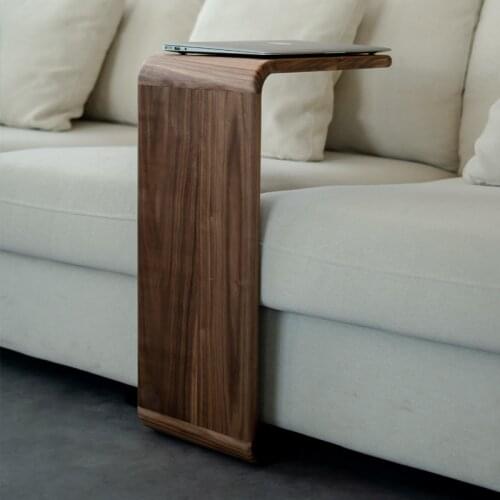 Modern minimalist sofa corner a few small black walnut creative bedside table