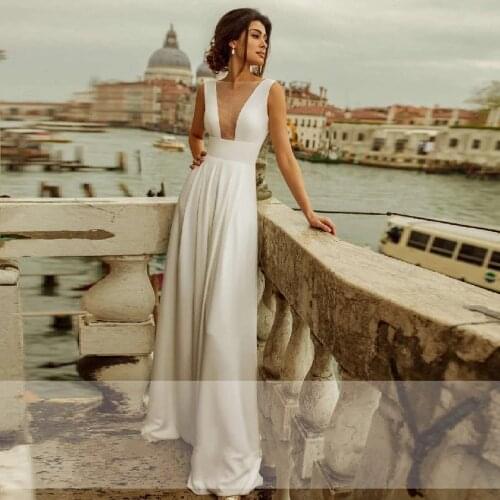 Sexy V-Neck Illusion Wedding Jumpsuit Ivory Satin Bride Gowns 2020 Backless A Line Wedding Dresses Elegant Vestidos De Novia