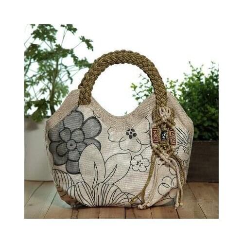 Hot String Appliques Shopping Small Handbags!Nice National Floral Embossing Women Top-handle bags New Nice Tassel Canvas Carrier