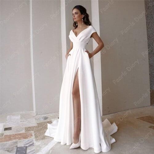 Modest V-neck Satin Wedding Dresses 2021 Luxury Short Sleeve Sweep Train Beach A Line Bridal Gowns with Pockets Bride Dress