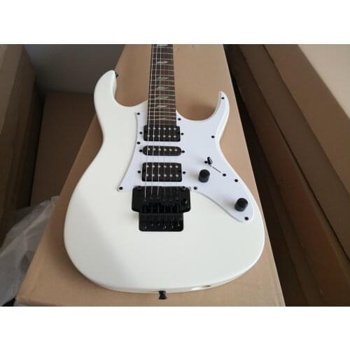 Electric guitar,6 strings milk white guitar,HSH pickups,tremolo bridge,black button,basswood body,maple neck,rosewood fingerboa