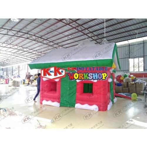 Inflatable Christmas House Christmas homes filled with colors and styles Shop advertising inflatable tent