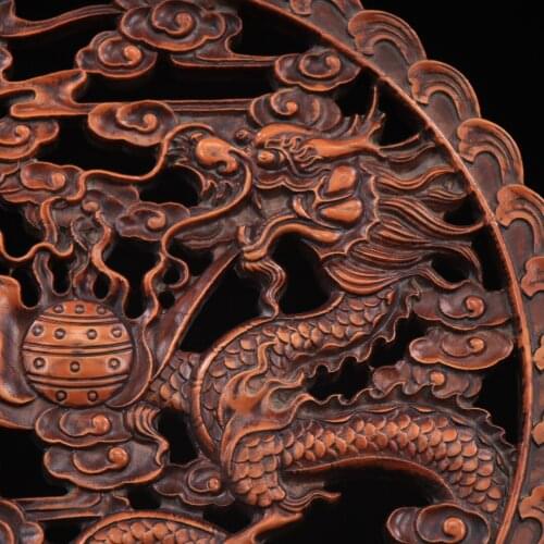 Collection of boxwood hand-carved double dragon play beads plaque