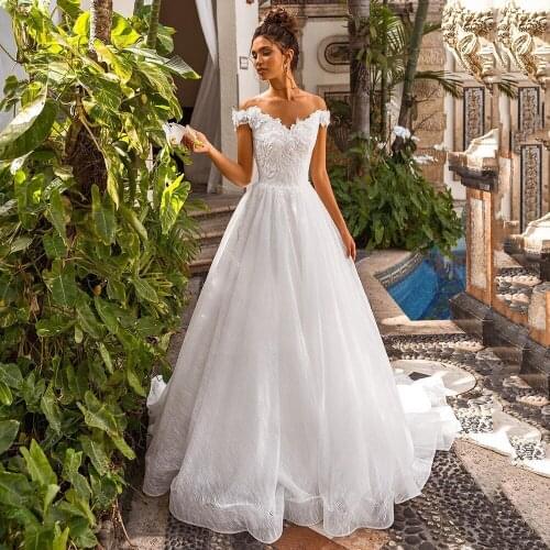 UZN Wedding Dress A-Line V-Neck Beading Lace Appliques Glitter Tulle and Satin Bridal Gown Off Shoulder Straps Brides Outfits