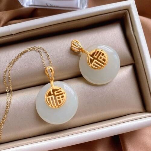 Natural Hetian white jade hollow round Pendant Necklace Chinese style retro palace style creative womens silver jewelry