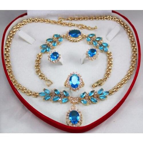A set zircon necklace, earing, bracelet ring set