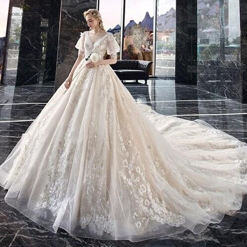 Ball Gown Wedding Dresses for Women V-Neck Appliques Beaded Wedding Gowns Court Train Bridal Dresses With Short Sleeves