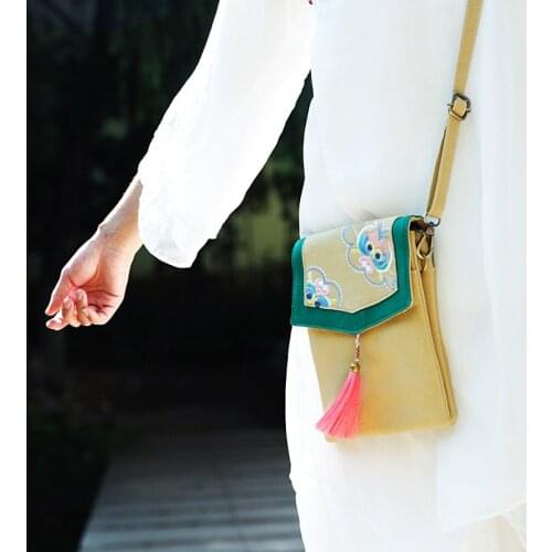 Characteristics of original color embroidery design of a new canvas hanfu bump flow Su Sen female inclined shoulder bag