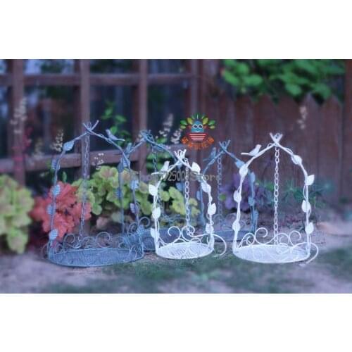 Hanging flower baskets, hanging bird feeders, succulent flower pots, wrought iron flower stands