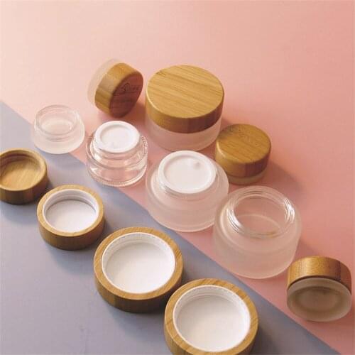 Wholesale Beauty Refillable Frosted Clear Glass Skin Care Cream Jar With Bamboo Lid Eye Cream Cosmetic Container Packaging