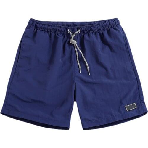 60%HOT Men Casual Breathable Quick Dry Pants Pockets Beach Solid Color Sport Shorts