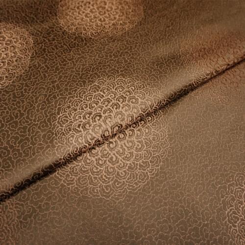 Chinese cloud-pattern brocade jacquard Brownish yellow clouds Satin silk fabric DIY patchwork bag Book cover Doll hanfu clothes