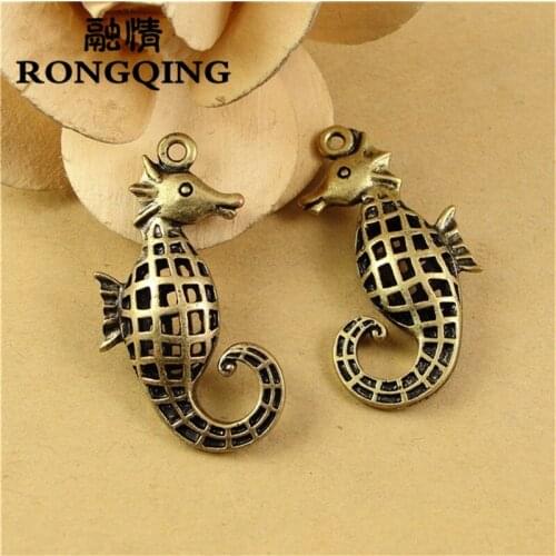 RONGQING 10pcs/lot 21*40MM Hollow Hippocampus ocean antique alloy charm pendant Charms fit Bracelets & Necklaces DIY Jewelry