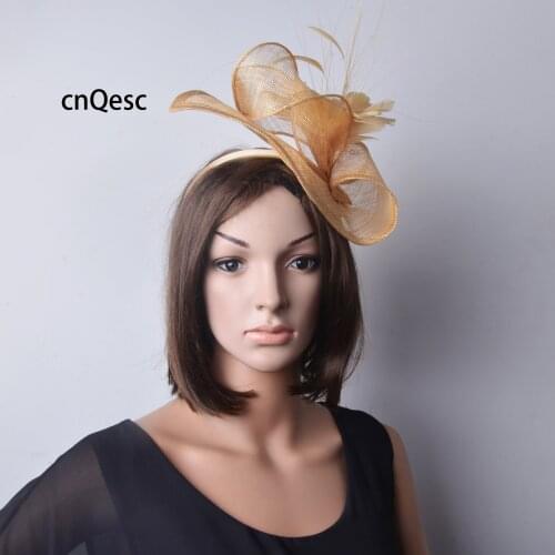 Champagne gold sinamay fascinator kentucky derby hat