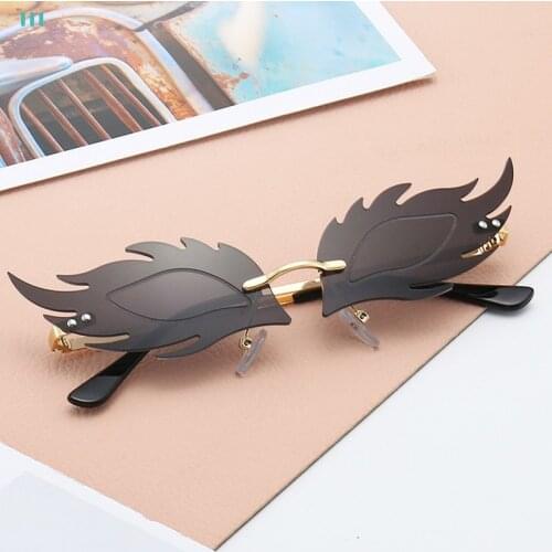 Fashion Luxury Fox Fire Flame Sunglasses Driver Goggles Women Rimless Wave Punk Sun Glasses Metal Shades Vintage Eyewear UV400