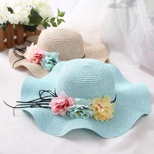 Mingjiebihuo Fashionable cute new lady flower wave hat outdoor sunscreen straw hat Multipurpose woman