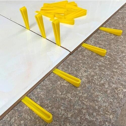 100pcs Plastic Wedge Tiling Spacer Wall Floor Ceramic Tile Leveler flat laying Leveling System height adjuster Construction tool