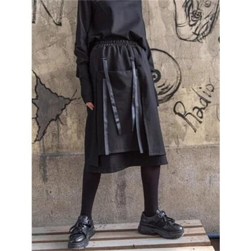 European station autumn and winter new womens Harajuku skirt elastic waist irregular large pocket a-line mid-length skirt