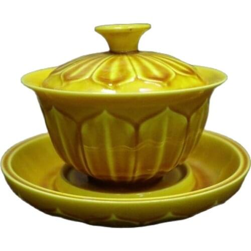 Chinese porcelain cup with yellow glaze lotus design
