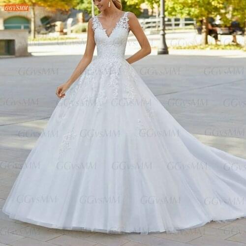 Gorgeous White Wedding Dress V Neck Backless robe de mariée 2021 Tulle Ball Gown Bridal Dresses Lace Appliqued vestidos de noiva