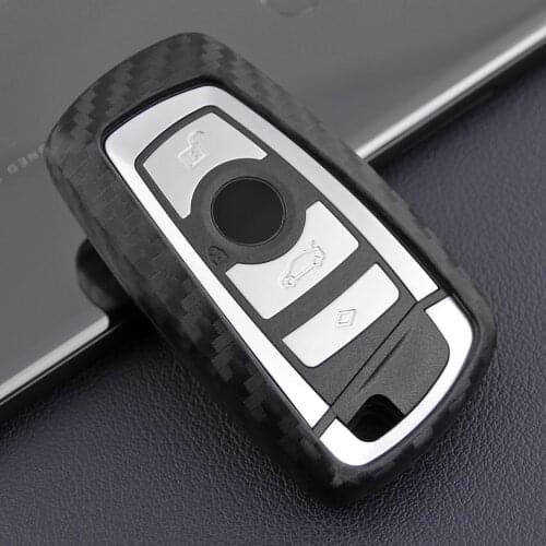 It is suitable for BMW new 5 Series, 3 Series and 1 Series 320LI528X3X4 new car carbon fiber silicone key case