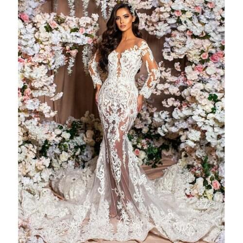 Sexy Mermaid Wedding Dresses Illusion Sheer Jewel Neck Long Sleeve Wedding Gowns Button Back Bridal Robe De Mariée