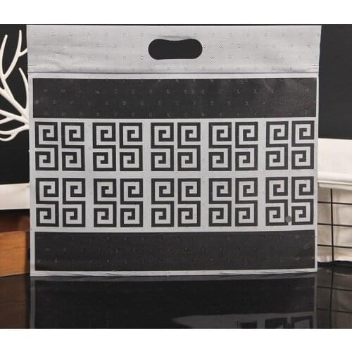 100pcs Thickening plus vest bag sweater pajamas set clothing packaging bags large non-woven storage bag hanging organizer