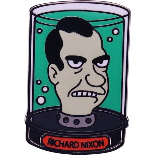 Funny lapel pin of former President Richard head in a jar, as seen in the cartoon TV series