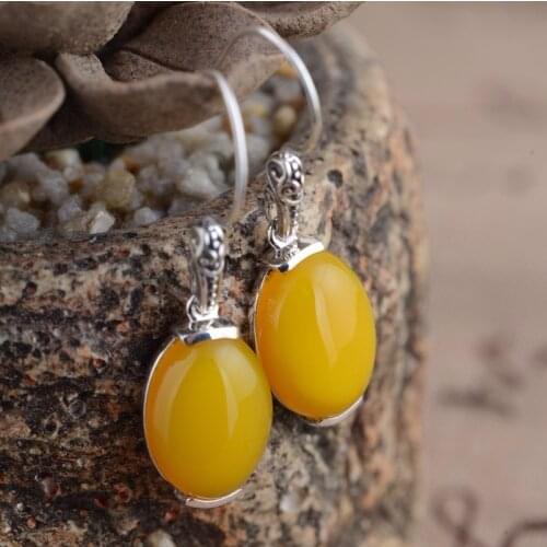 KJJEAXCMY fine jewelry S925 Silver inlay jewelry yellow jade medullary earrings retro classical art lace temperament female styl