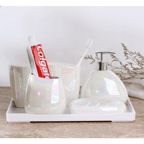 Japanese-style simple aurora matte white ceramic bathroom set of five Lotion bottle toothbrush holder soap dish bathroom kit