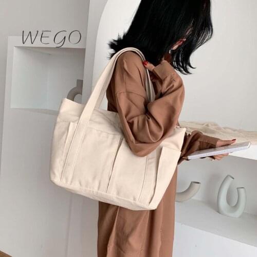 Large-capacity solid color Japanese canvas bag female shoulder bag student simple portable canvas bag wild female bag