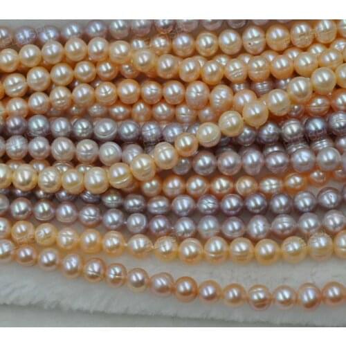 Wholesale 10 strands 7-8(6.5-7.5mm) pink purple cultured freshwater pearl loose strings