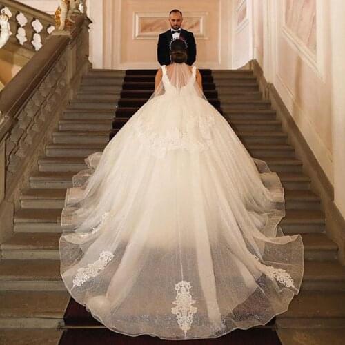 Luxury Ball Gown Wedding Dress Princess Glitter Tulle Lace Appliques Open Back Puffy Bridal Gown