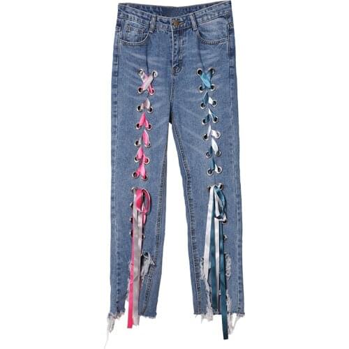 Thailand tide brand personality irregular hole jeans loose casual hollow out cross strap bandage trousers women