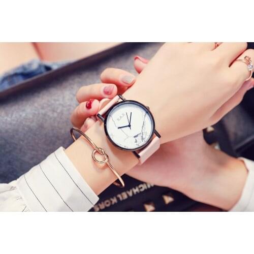 XAX Ladies Luxury Brand Pink Watch Women. Genuine Leather Watchband with Quick Release Pin Function