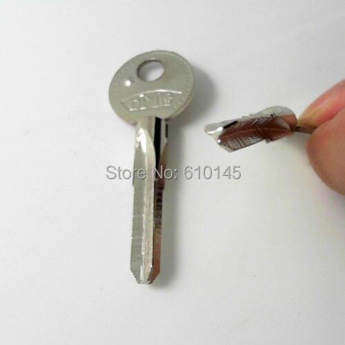 Cross blank door key