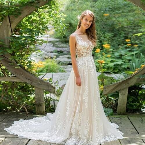 Bohemian Beach Boho Wedding Dresses Sheer Neck Sleeveless Appliques A Line Tulle Bridal Gowns 2021 Hot Sale Robe Mariage