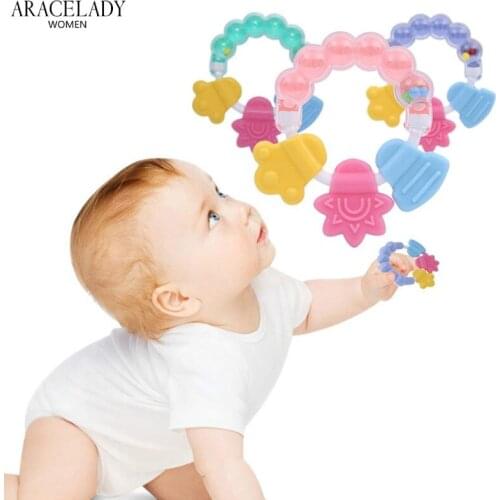 Silicone Handbell Jingle Cartoon Baby Teether Educational Mobiles Baby Toys Teeth Biting Baby Rattle Toy Bed Bell Silicone Beads