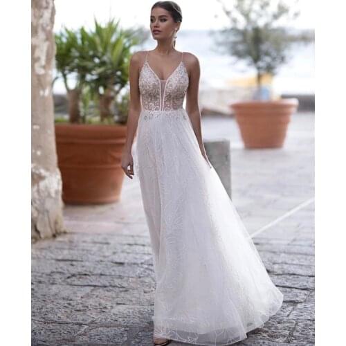 Wedding Dress A-Line V-Neck Spaghetti Straps Lace Appliques Sequined Beads Backless Floor Length Sweep Train Bride Gown 2021