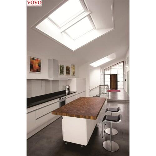 Handless kitchen cabinets in high gloss white