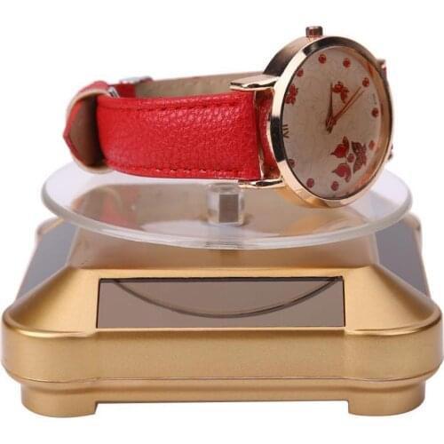 Brief Solar Power Rotating Jewelry Stand Phone Watch Display Holder Turning Table