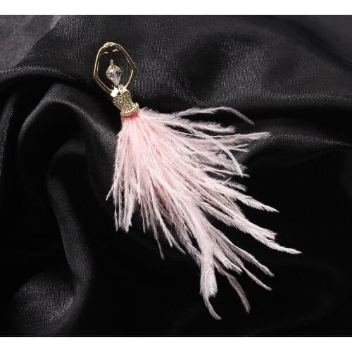 The new pink and white feather ballerina brooch is elegant and delicate with rhinestone brooches for women