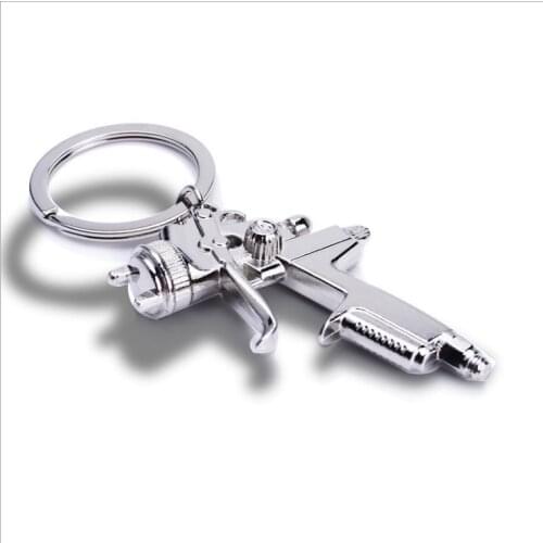 FREE SHIPPING BY DHL 100pcs/lot 3D Zinc Alloy Water Spray Gun Keychains Metal Water Pistol Keyrings for Gifts