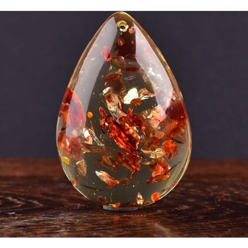 Flower amber pendant chain with the shape of the original stone amber beeswax sweater chain necklace and a rainbow