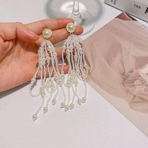 New exquisite pearl tassel bright zircon retro hollow buckle earrings exaggerated long female earrings