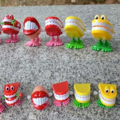 Creative Funny Chattering Jumping Teeth Clockwork Toy wholesale spring Plastic Toys Jump Teeth Chain For Kids Spring Toy
